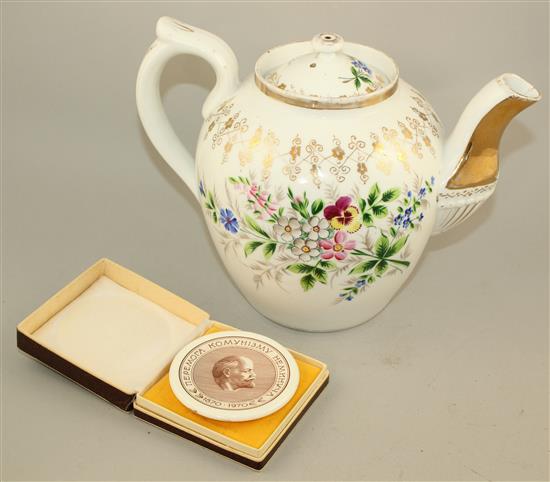 A Russian Kuznetsov porcelain large teapot and cover, and a Lenin commemorative plaque, 8cm